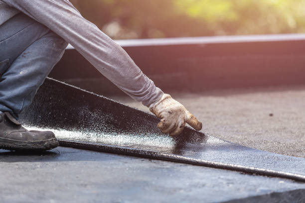 Professional Basement Waterproofing technician working in Cayuga, NY